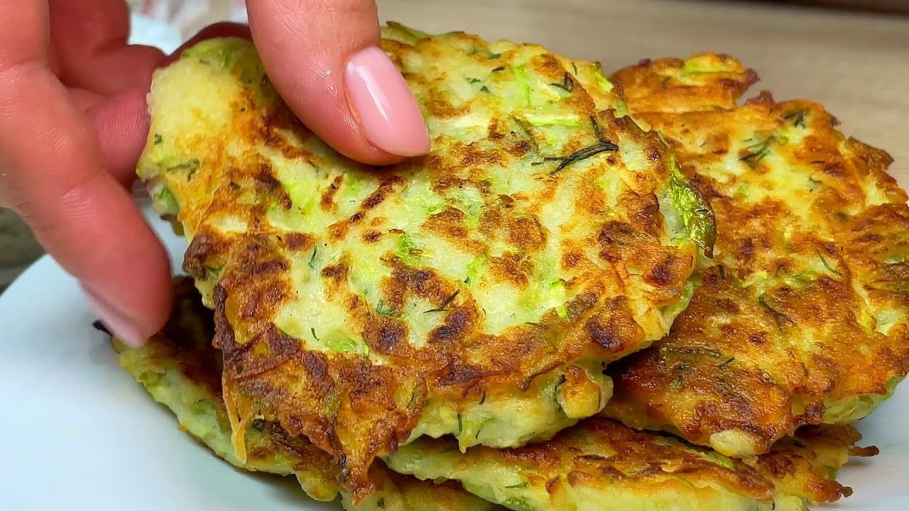 Gluten-Free Zucchini Fritters with Garlic Dill Cream — Tender zucchini fritters bound with egg and rice flour, pan-fried until golden a