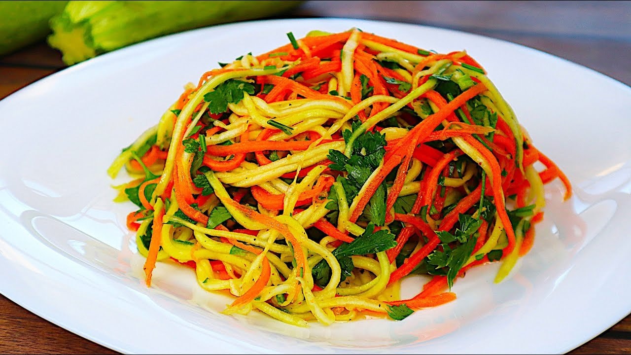 Vitamin Zucchini Carrot Garlic Salad — Crisp raw salad with grated zucchini and carrot, chopped parsley, fresh garlic a