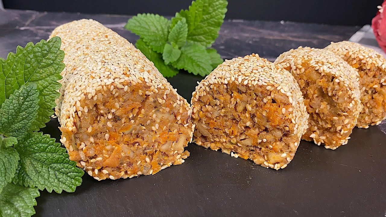 Rulo energético de frutos secos y fruta deshidratada sin horno — Rulo frío de nueces tostadas, semillas de calabaza y girasol ligado con dátiles,